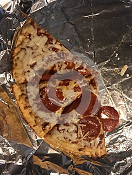 Cut Pizza Halfway gone on aluminum foil