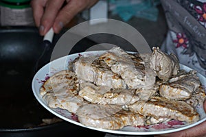 Cut pork tenderloin as medallions and sautÃ©ed on both sides in the pan