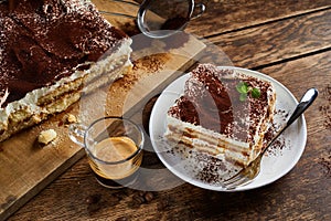 Cut portion of freshly made Italian tiramisu