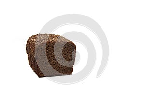 Cut pumpernickel bread isolated on white background