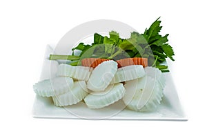 Cut radish, carrot and celery for cooking soup