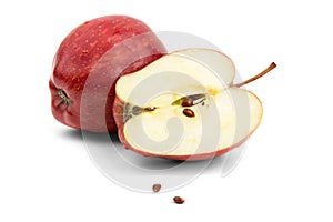 Cut red apple with seeds