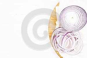 Cut in rings, slices of purple onion.