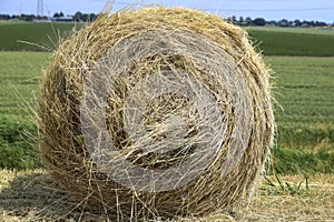 Cut sides of road like hay in a roll