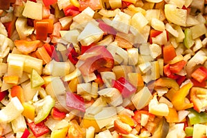 Cut slices pieces of red, yellow and green sweet bell pepper