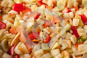 Cut slices pieces of red, yellow and green sweet bell pepper