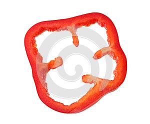 cut slices of red sweet bell pepper isolated on white background. top view