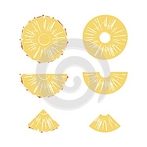 Cut slices of ripe pineapple on a white background