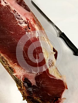 Cut of Spanish ham at the beginning