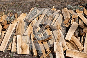 pile of cut oak firewood pieces