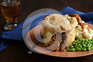 Cut steak pie with a fork