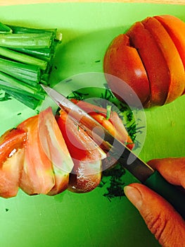 Cut tomato on the table