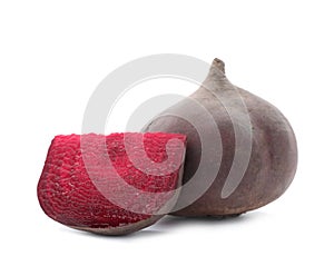 Cut and whole beets on white background.