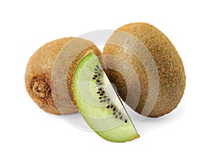 Cut and whole fresh kiwis on white