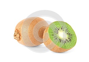 Cut and whole fresh kiwis on white background