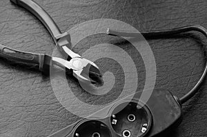 Cut wire of electrical splitter and side cutters