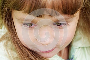 Cute 4 years old girl with long eyelushes