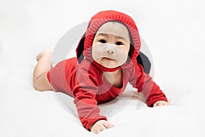 Cute 6-7 months little asian baby boy in casual outfit and hat sitting on white blanket cool and happily at home,Stylish