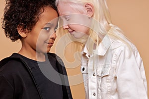 Cute adorable diverse children posing at camera