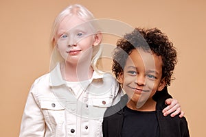 Cute adorable diverse children posing at camera