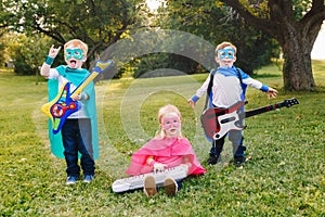 Preschool Caucasian children playing superheroes