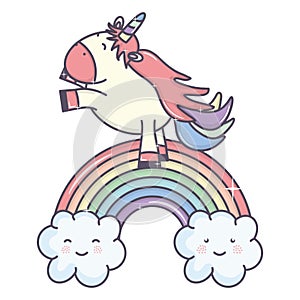 Cute adorable unicorn with clouds and rainbow