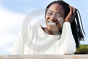 Cute african teen girl with charming smile.