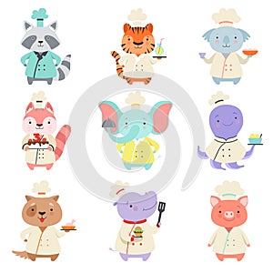 Cute animals in chef uniform set, cartoon pets characters cooking delicious dishes vector Illustration on a white