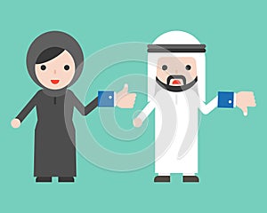 Cute Arab businessman and muslim woman holding like and unlike b