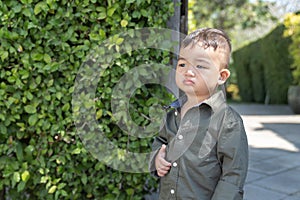 Cute Asian baby boy in the garden