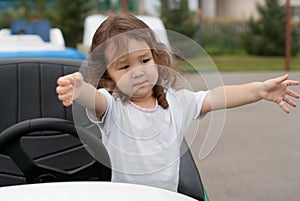 Cute asian baby on the rudder