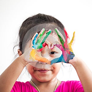 Cute asian child girl with hands painted make heart shape