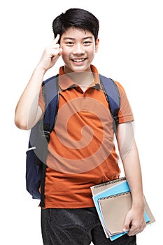 Cute asian child with school stationery on white background