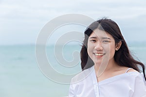 Cute asian fat teen portrait toothy smile happy holiday