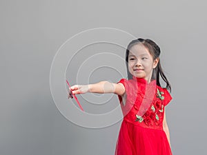 Cute Asian girl in chinese cheongsam and Tradition Chinese dress with red envelope , Chinese new year concept