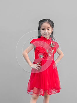 Cute Asian girl in chinese cheongsam and Tradition Chinese dress with red envelope , Chinese new year concept