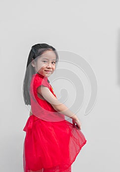 Cute Asian girl in chinese cheongsam and Tradition Chinese dress with red envelope , Chinese new year concept