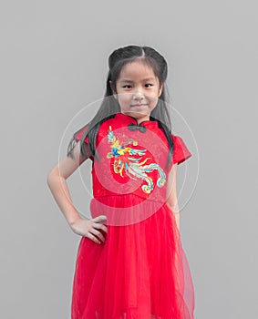 Cute Asian girl in chinese cheongsam and Tradition Chinese dress with red envelope , Chinese new year concept