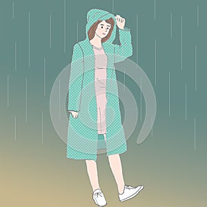 a cute Asian girl with a green Raincoat