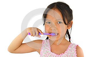 Cute asian girl and toothbrush