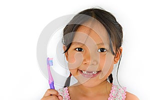 Cute asian girl and toothbrush