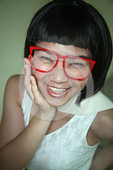 Cute Asian girl wearing glasses