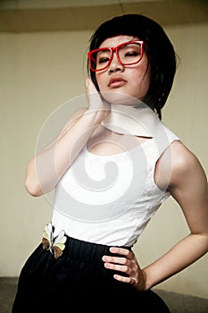 Cute Asian girl wearing glasses