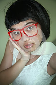 Cute Asian girl wearing glasses