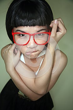 Cute Asian girl wearing glasses