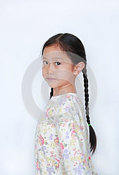 Cute asian little child girl looking camera from backside  on white background