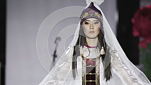 Cute asian woman costume tradition slow motion walk catwalk China. Girl show.