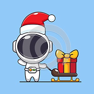 Cute astronaut carrying christmas gift box. Cute christmas cartoon character illustration.