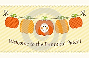 Cute autumn garland with pumpkins in traditional colors