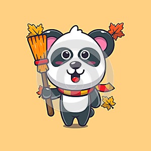 Cute autumn panda holding broom.